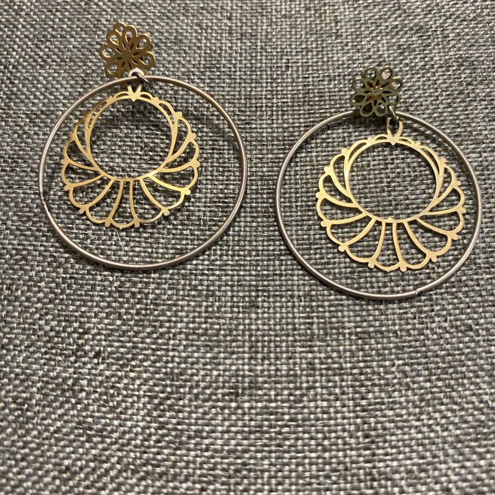 Goldtone pierced dangle earrings.